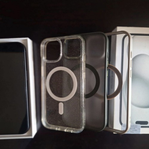 iPhone 15 black like new with 3 cases