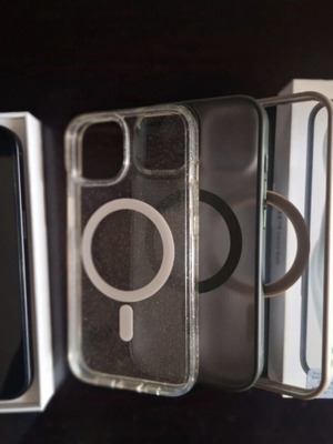 iPhone 15 black like new with 3 cases