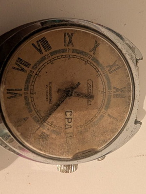 Slava Automatic wristwatch vintage Soviet cushion case Roman numerals