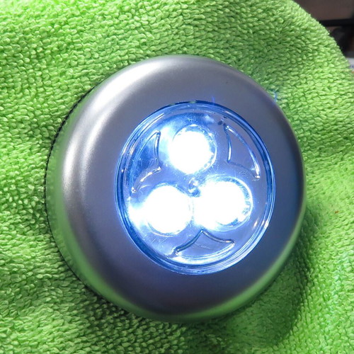 Set of 2 used LED push lights for closets with battery power