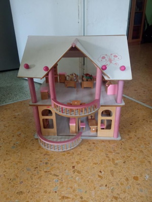 Wooden dollhouse used with furniture and 4 figures