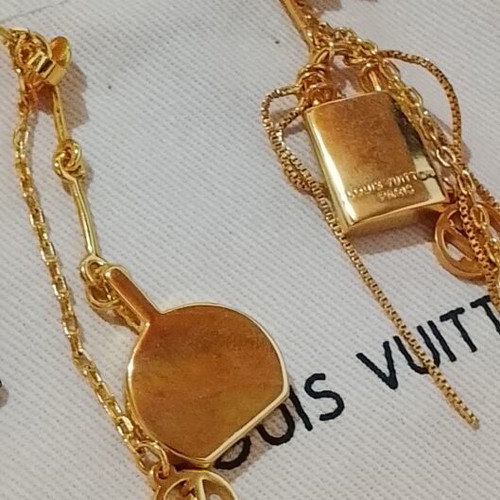 Louis Vuitton stainless steel earrings, rare sold out design, gold tone