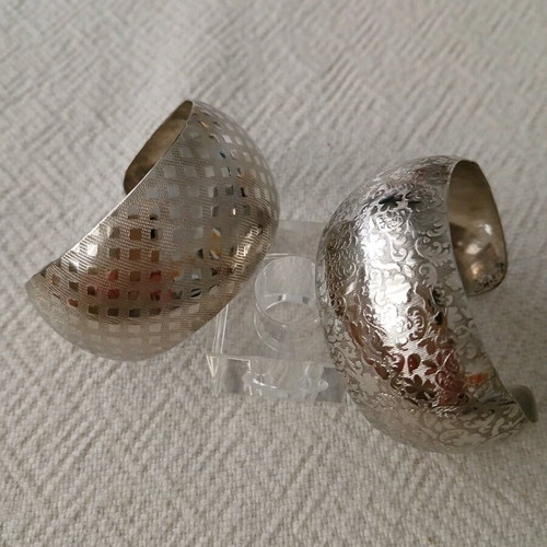 Vintage cuff bracelets like new, embossed geometric and floral design, set of 2
