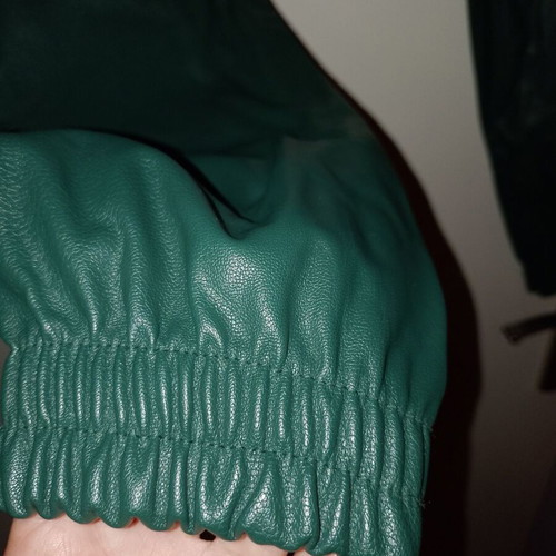 Green faux leather pants with elastic waist and ankle, like new