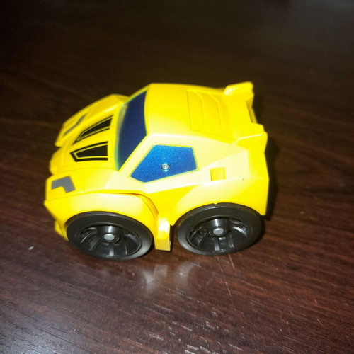 Children's toys used, yellow Transformer car, airplane, fire truck