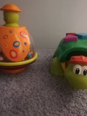 Baby toys used, pack with turtle and ball toy