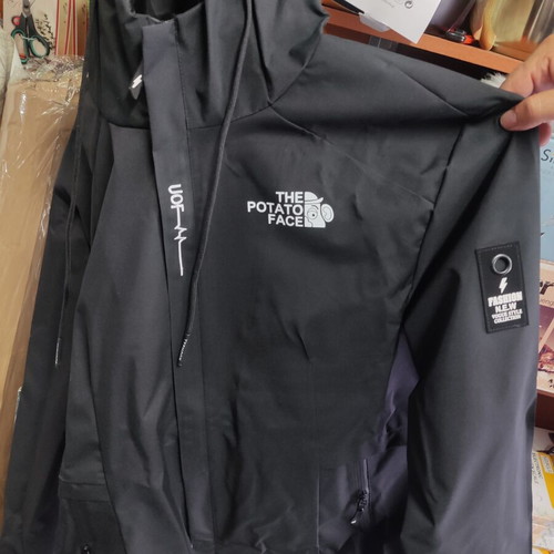 Black waterproof windbreaker jacket, men's size L