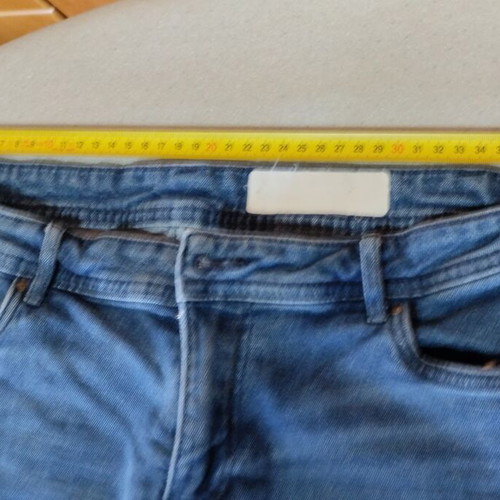 Denim shorts used, size 38, blue with frayed hem