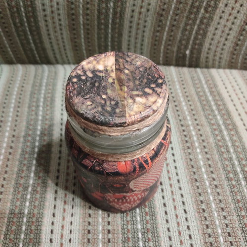 Glass jar with lid, decoupage decoration and raw twine