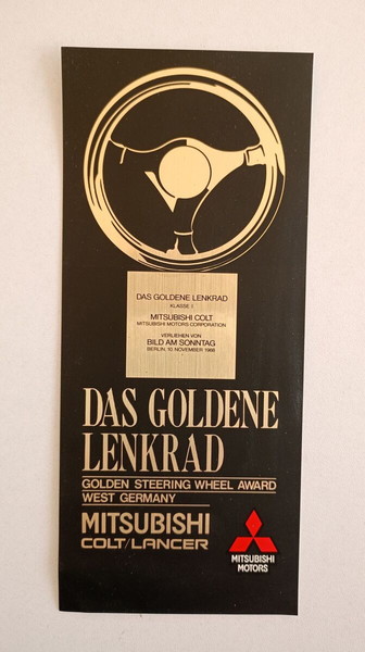 Αυτοκινητιστικό αυτοκόλλητο "MITSUBISHI MOTORS"-MITSUBISHI COLT/LANCER, DAS GOLDENE LENKRAND του ΄90