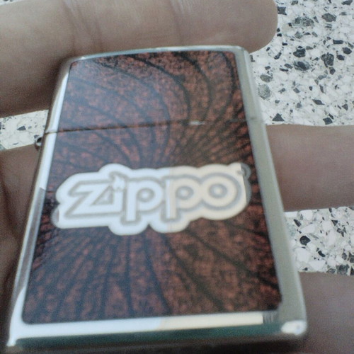 Zippo 2011 lighter with embossed design