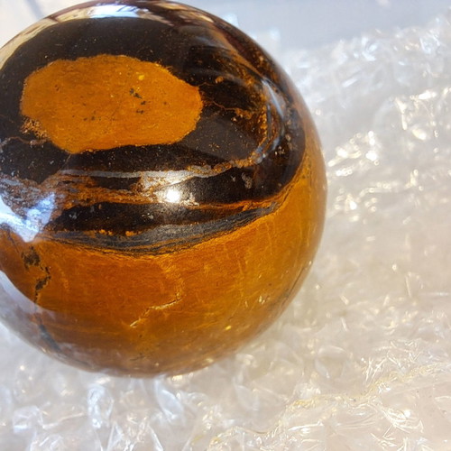 Tiger's Eye new, diameter 50.3 mm, weight 201.73 g