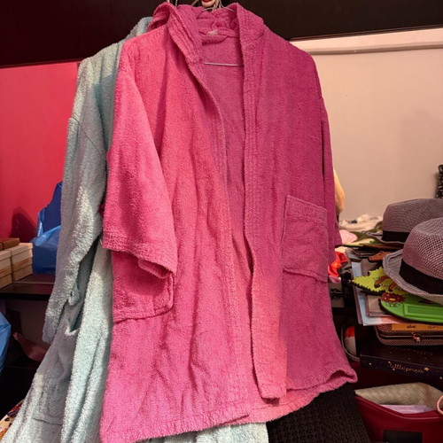 Bathrobes used, pink with hood and blue