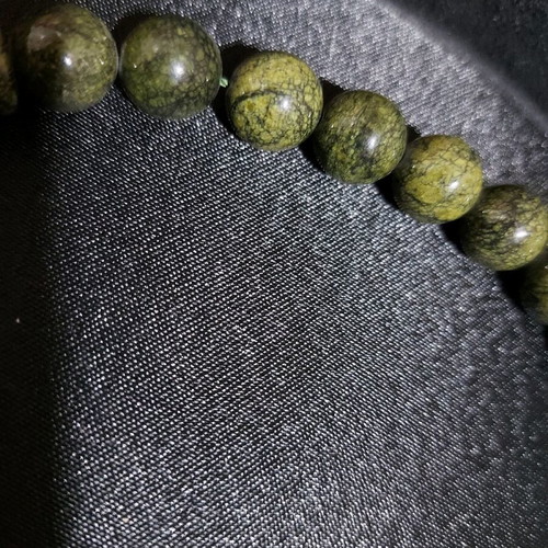 Decorative worry beads from semi-precious spiral stone