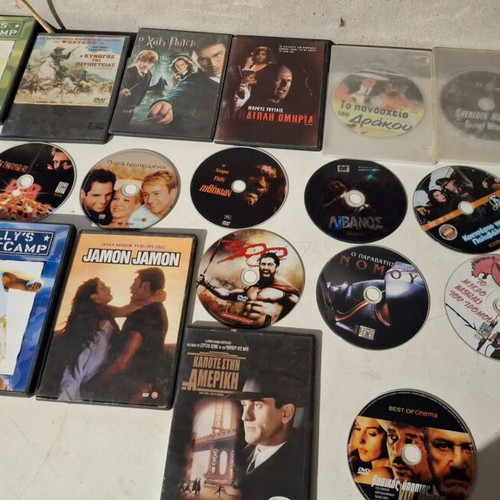 DVD movie pack used, 27 discs with and without cases, action genre