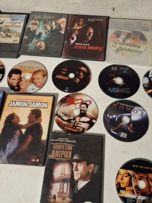 DVD movie pack used, 27 discs with and without cases, action genre