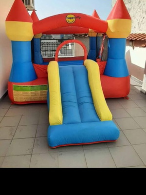 Happy Hop inflatable castle with trampoline and slide