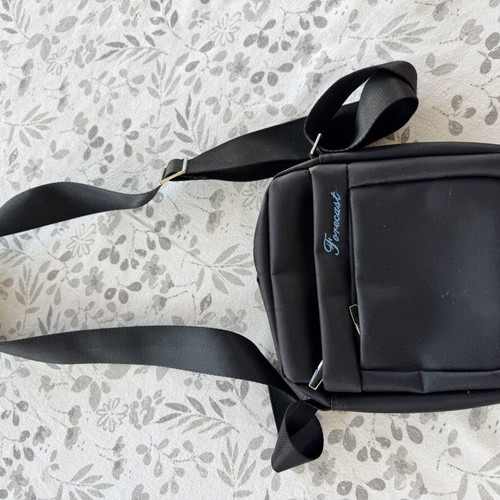 Men's black shoulder bag with 3 zippered compartments