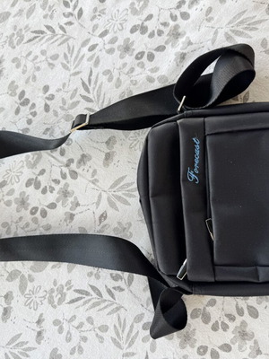 Men's black shoulder bag with 3 zippered compartments