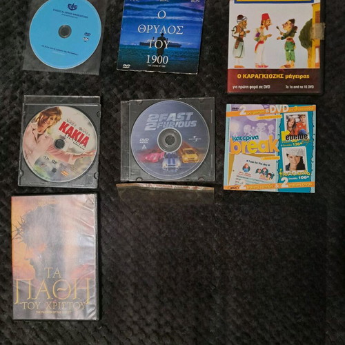 Pack of 8 DVDs used with minor scratches, playable