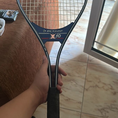 Dunlop X10 professional tennis racket with balls