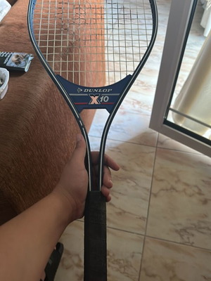 Dunlop X10 professional tennis racket with balls