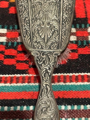 Vintage hairbrush with double-headed eagle used