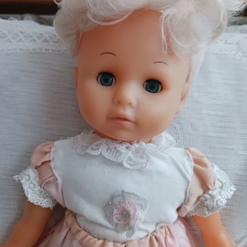 Vintage doll with handmade clothes like new