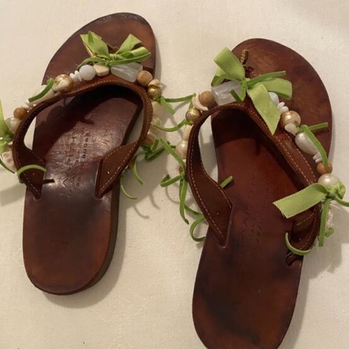 Leather slippers like new, decorated with beads and green ribbons, size 36
