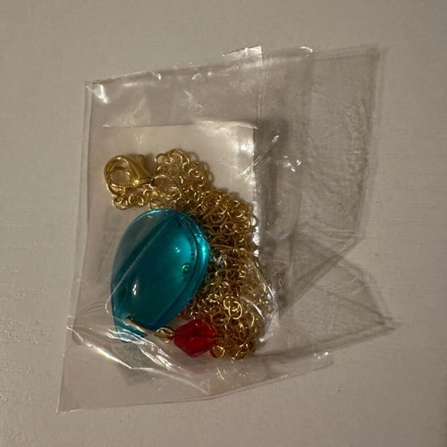 Hauru necklace from Howl's Moving Castle like new, zinc and PVC