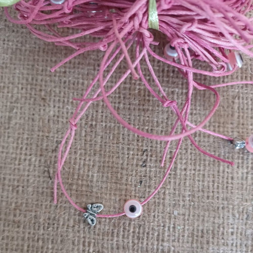Baptism bracelets for girl with metal butterfly and eye bead, new, pack of 100