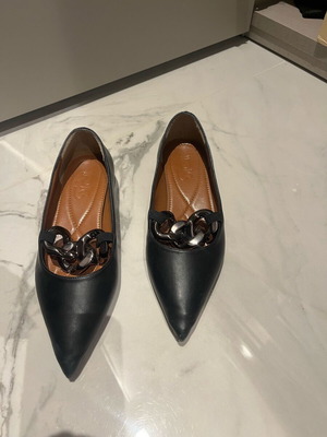 Black straight pumps size 36 used with metal chain detail