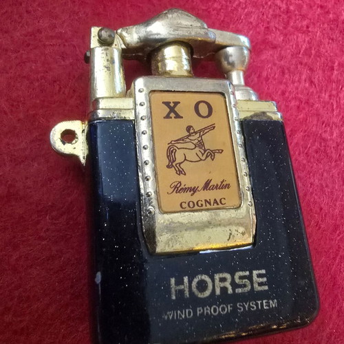 Remy Martin lighter used, collectible