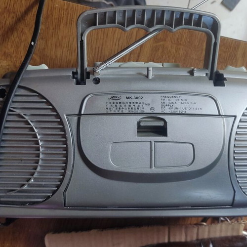 Radio cassette player with power cable