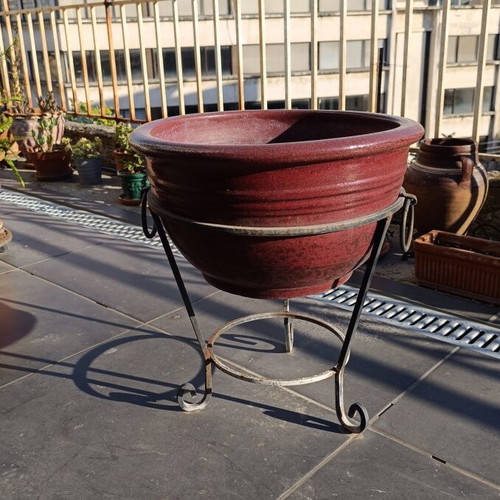 Large glazed ceramic flowerpot with decorative iron stand, like new