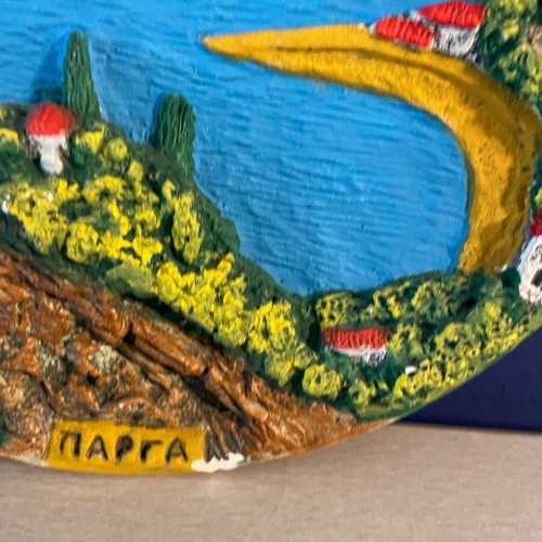 Embossed handmade decorative wall plate used with Parga depiction