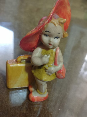 1960s figurine used, girl with suitcase