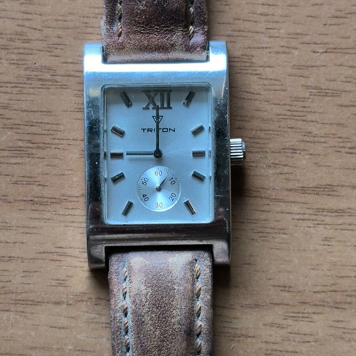 Triton wristwatch with white dial and brown leather strap