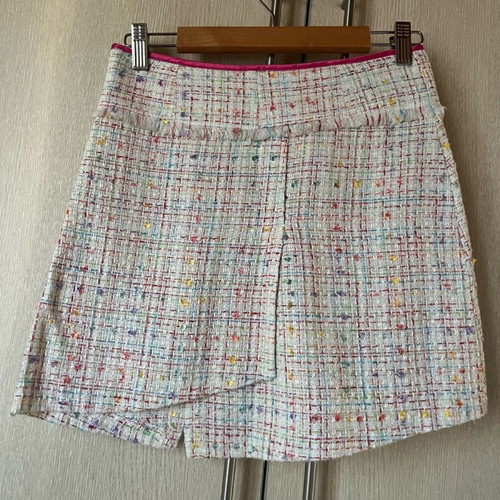 Mini tweed skirt with cutouts like new, XS