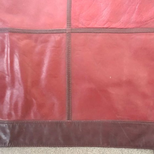 Leather rug new in burgundy and brown color
