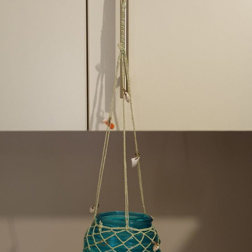 Hanging tealight candle holder with decorative shells
