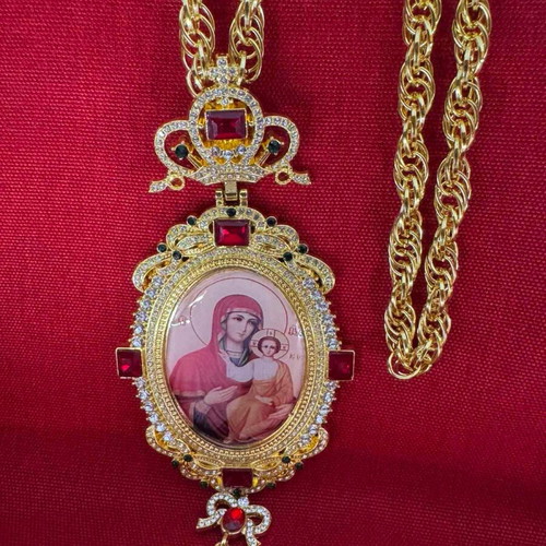 Religious pendant new gold-plated with small defect