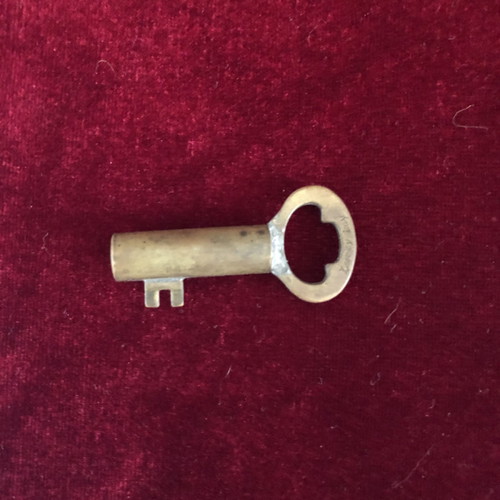 Antique brass lighter in key shape