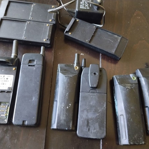 Vintage mobile phones pack used with original chargers for collection