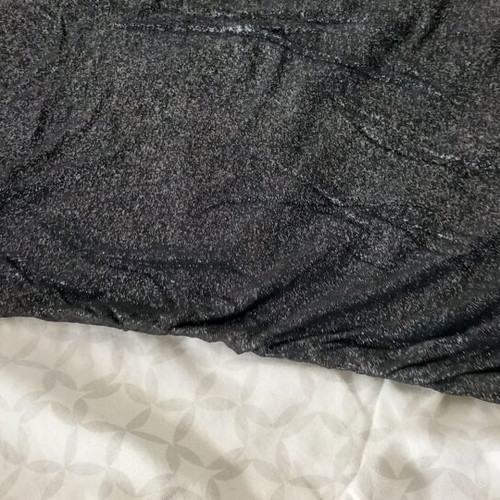 Sleeveless top, shiny elastic fabric. Size M/L