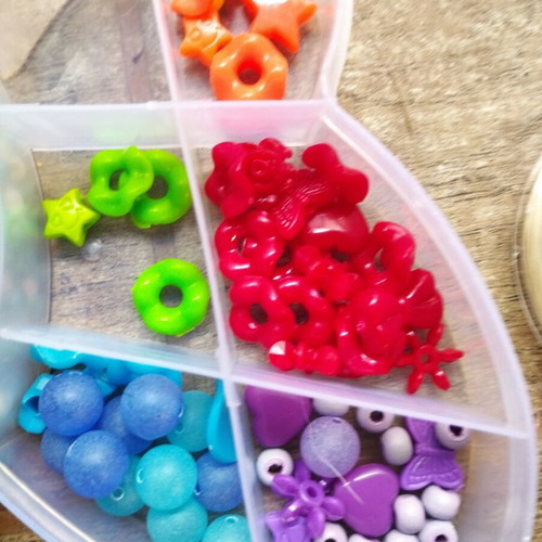 Colored beads used with thread, incomplete set