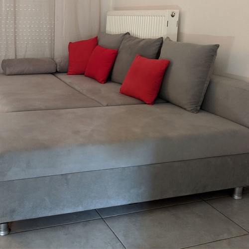 Corner sofa bed gray used with storage space