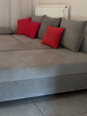 Corner sofa bed gray used with storage space