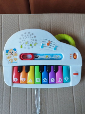 Fisher Price piano used with worn sticker