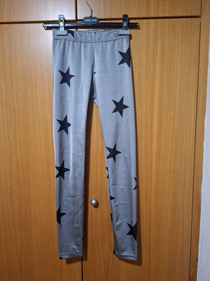 Hyper women's silver leggings with black stars, one size